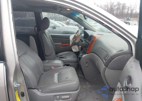 2009 Toyota Sienna Limited z USA, uszkodzony, nr VIN 5TDBK22CX9S025066